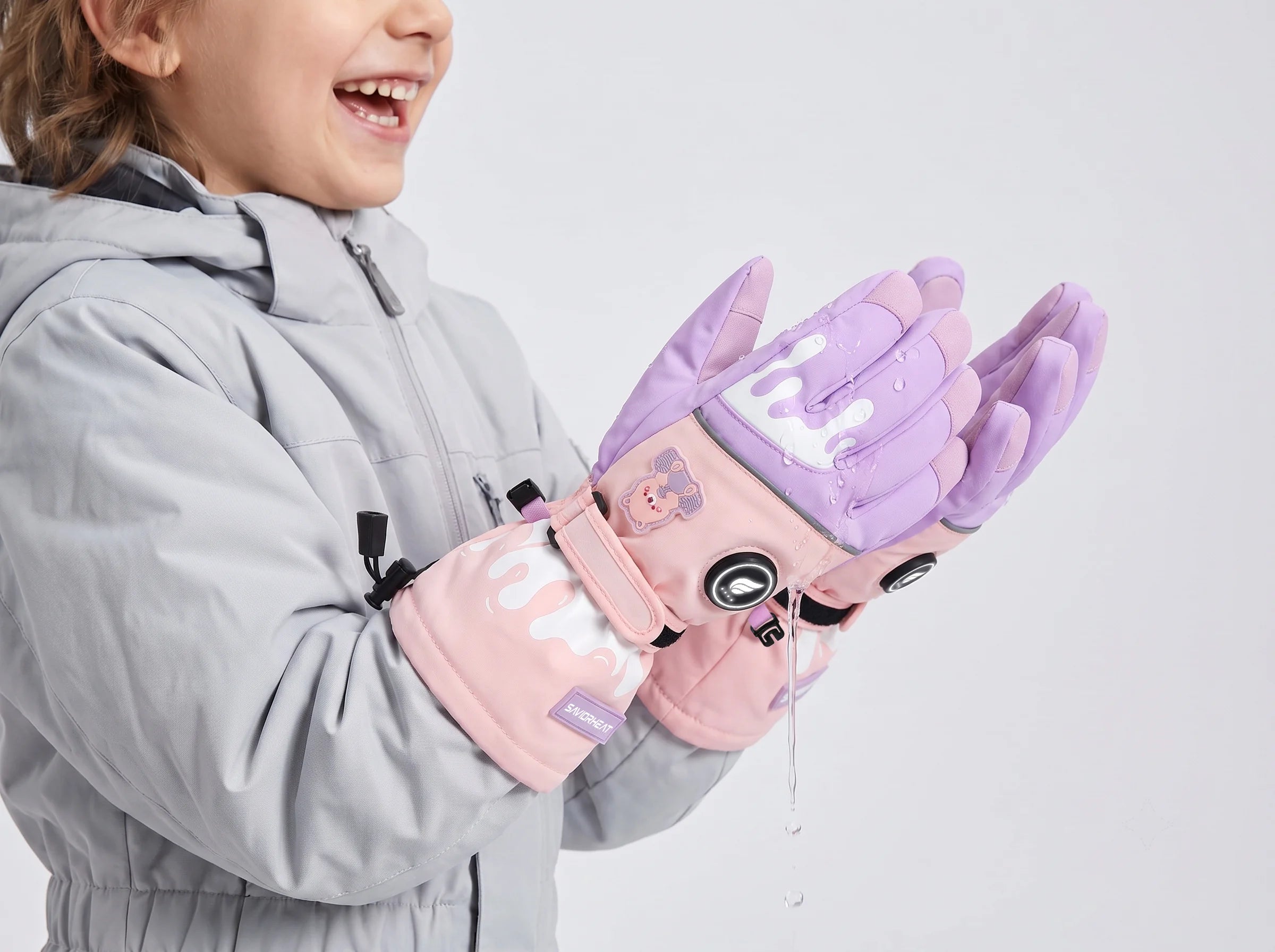 Water-Resistant Protection on Bear-Print Kids Heated Ski Gloves by SAVIOR HEAT