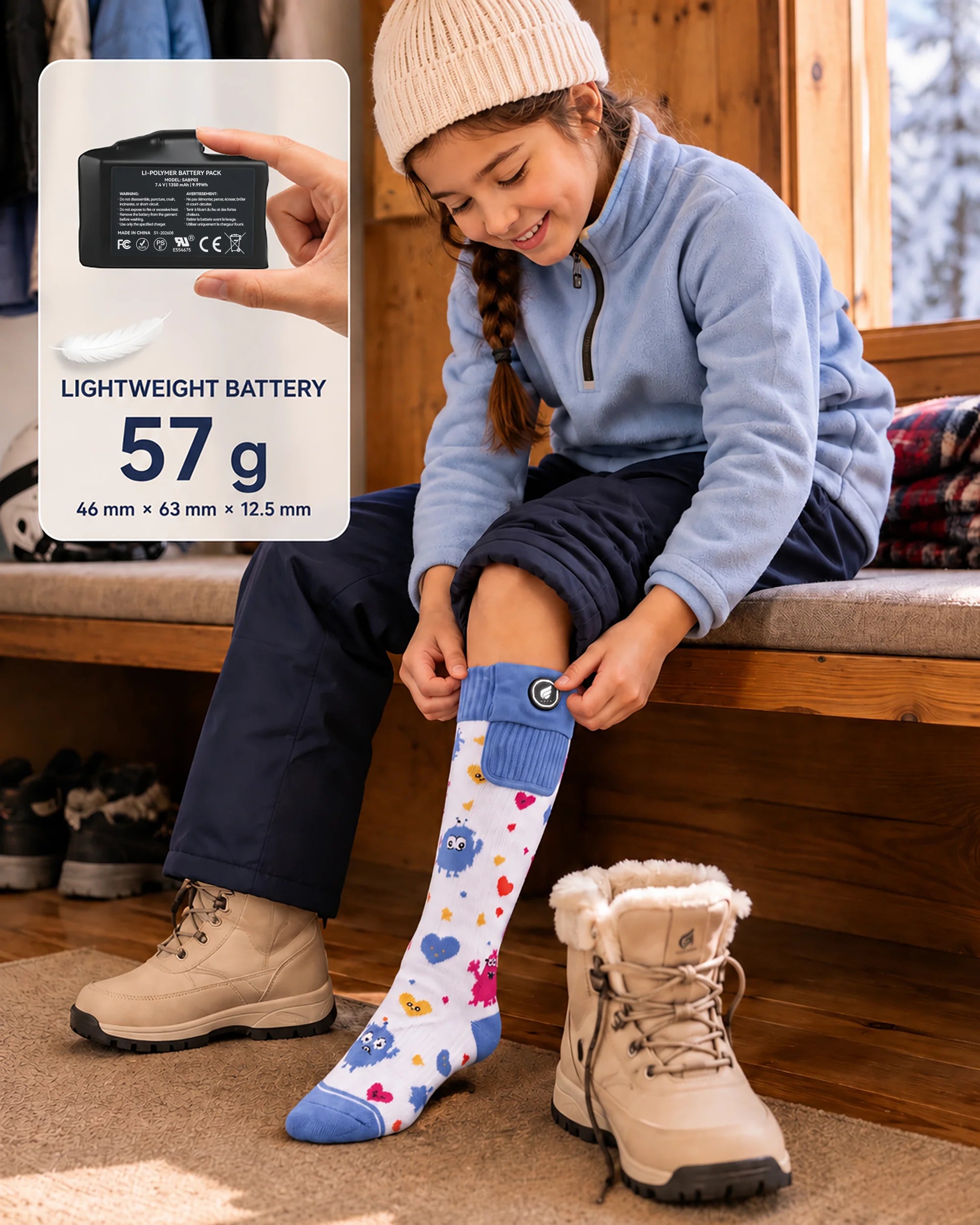 SAVIOR HEAT Monster-Print Kids Heated Ski Socks with a lightweight kid-friendly battery for comfortable winter wear